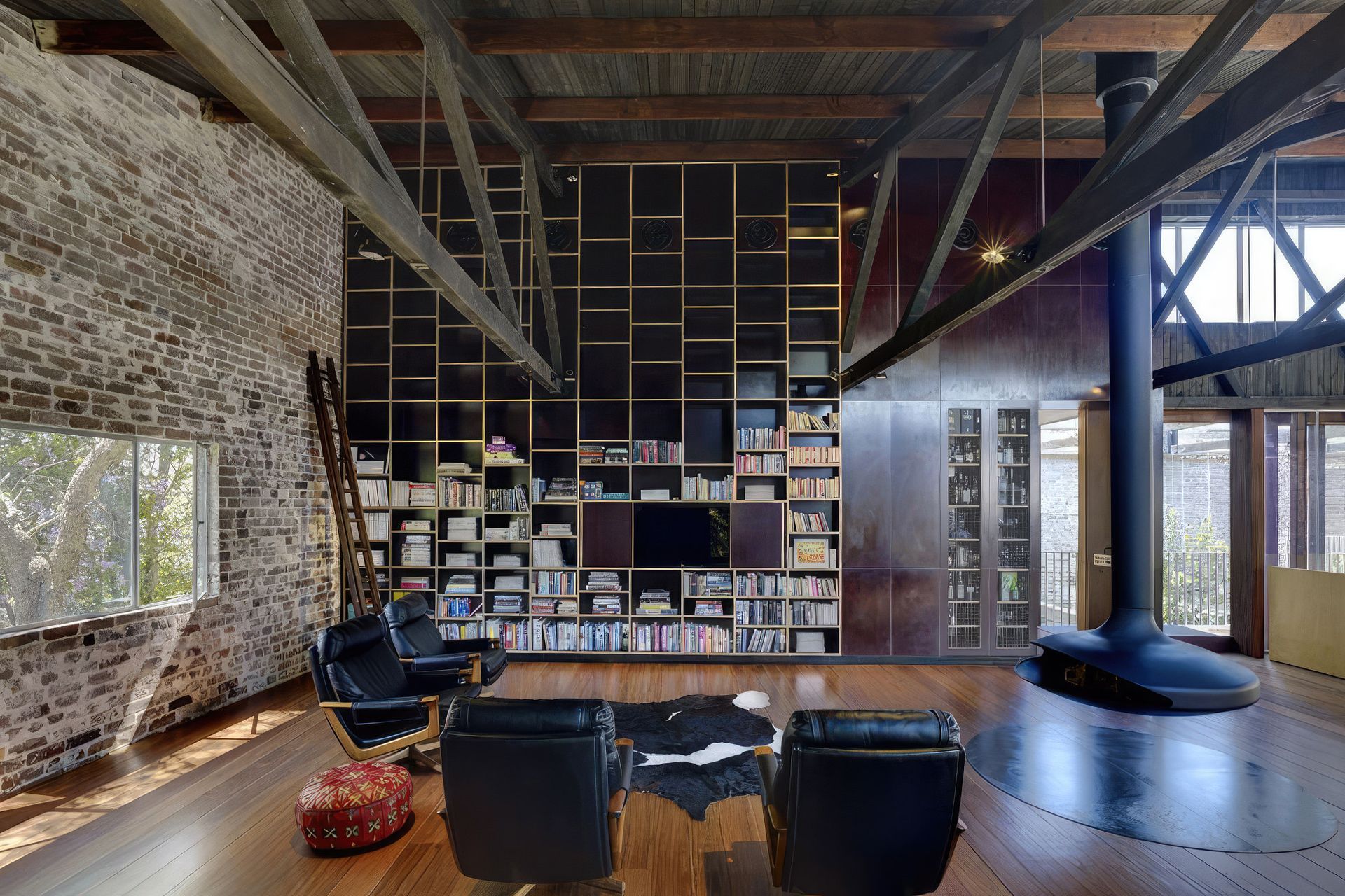 In this warehouse conversion, recycled bricks are a feature that grounds the home.