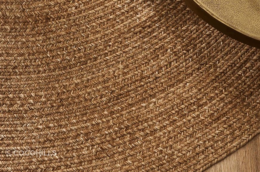 The Mornington rug in 'Teak' from Cocohills can transition easily from indoors to outdoors.