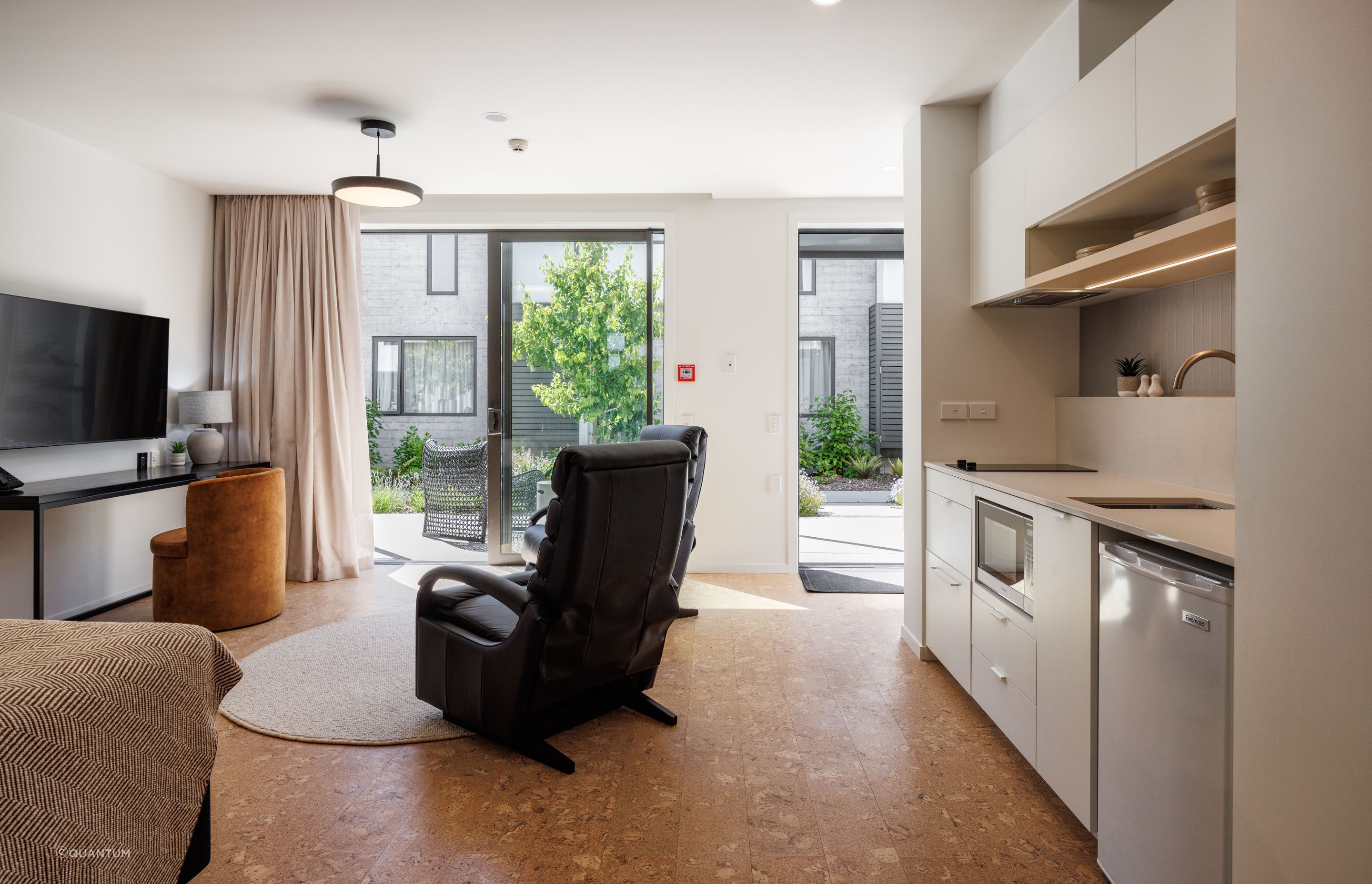 “The design team selected Quantum's Wise Cork in Original Shell to align with the natural theme of the NZCIS interiors. The cork planks provided a unique aesthetic that distinguished the apartments from other accommodation options. Additionally, the natural properties of cork, such as warmth and acoustic benefits, made it an ideal choice for this high-performance environment.”