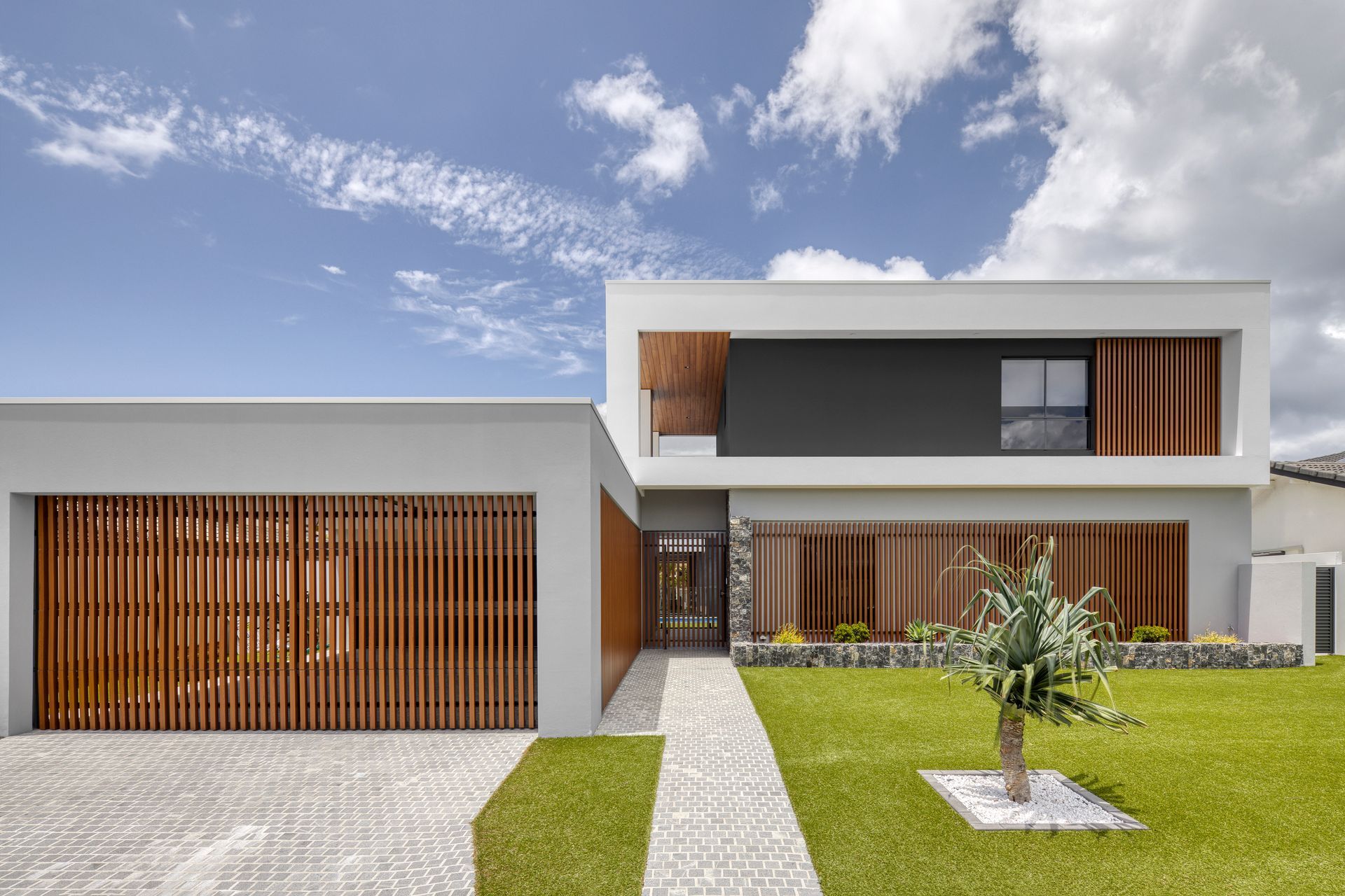 Paradise Waters Residence by Habitat Studio Architects | Photography by Kristian Van Der Beek