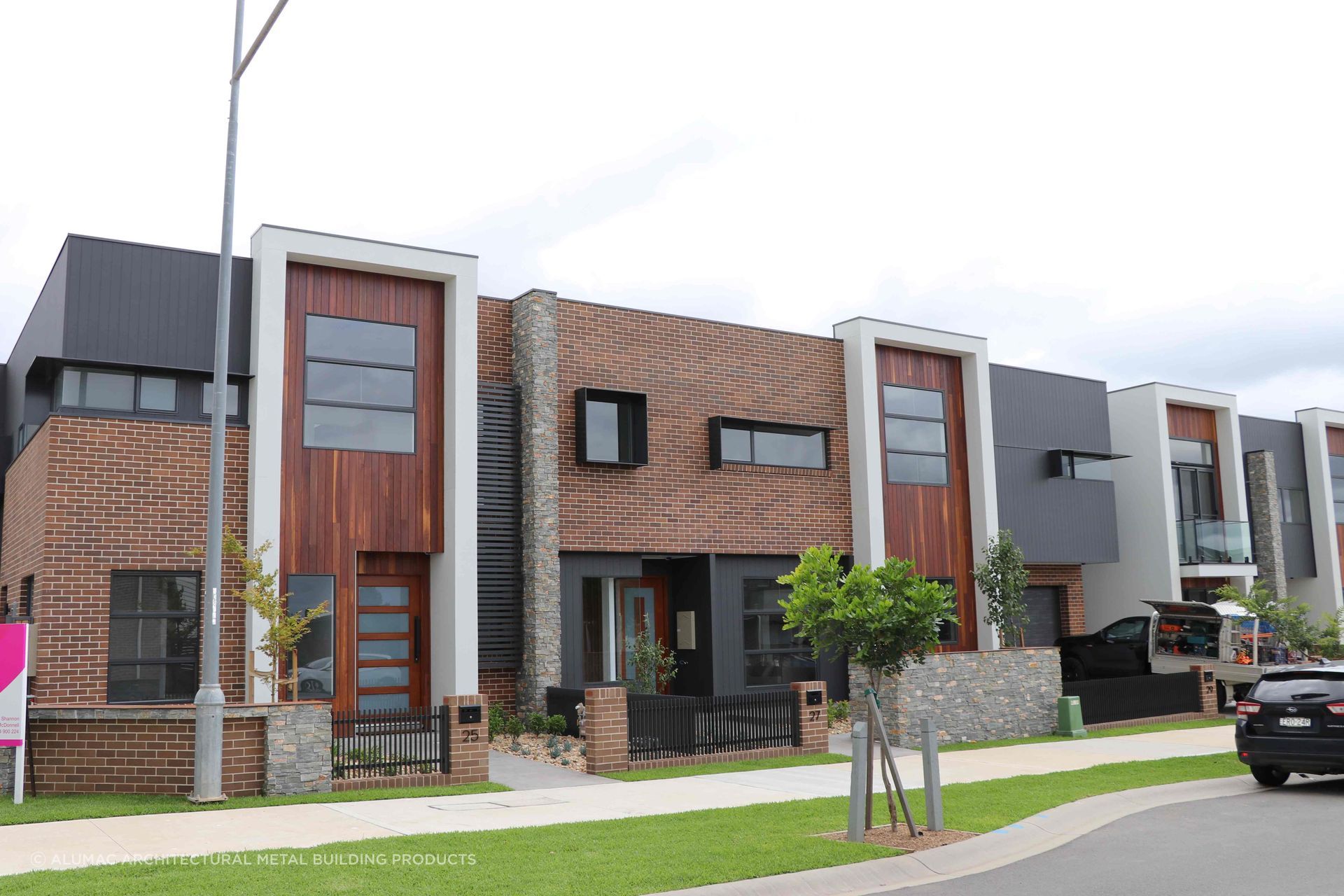 Alumac's Trendline window shrouds provide a sharp architectural detail as well as performance benefits.