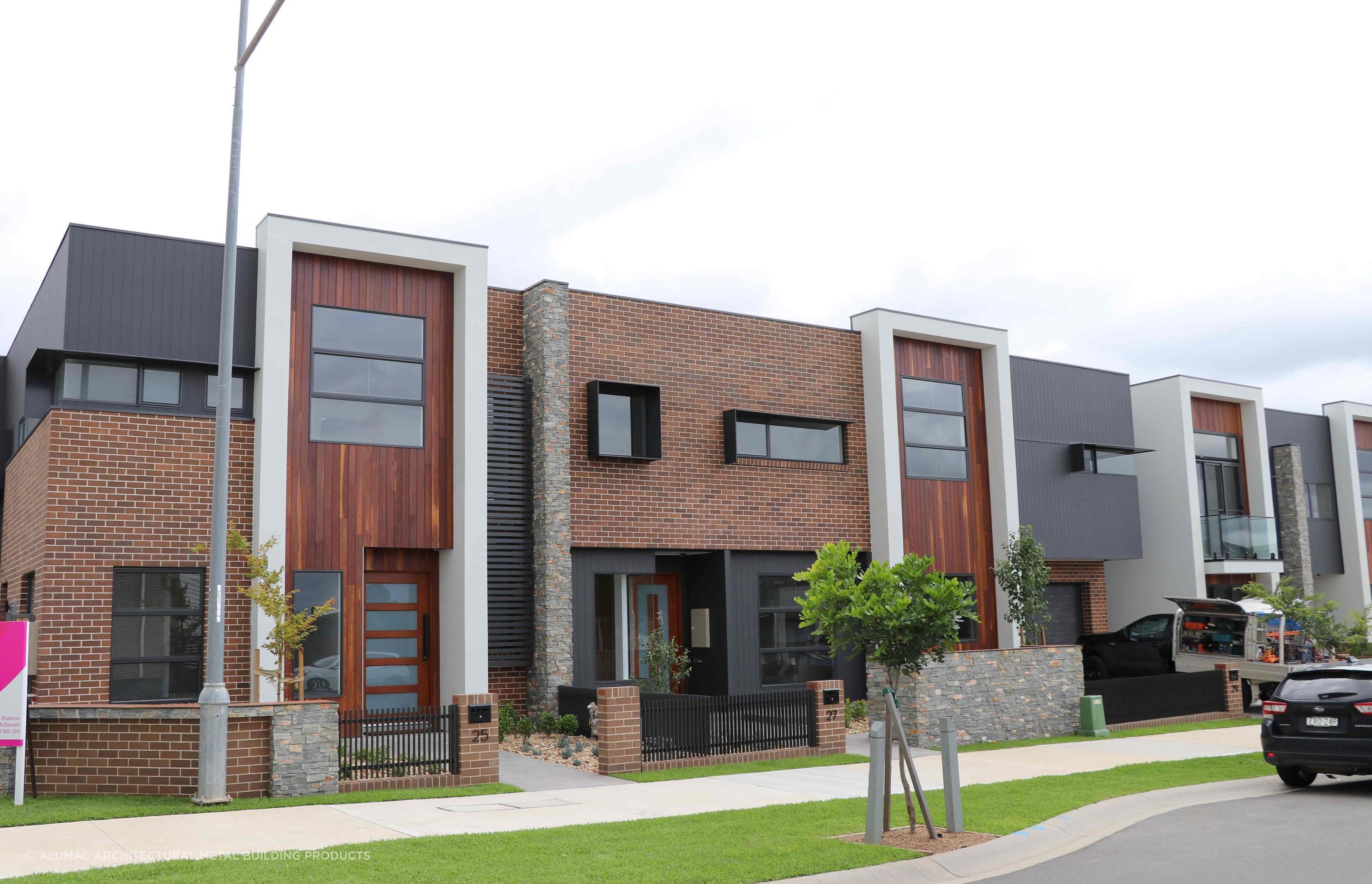 Alumac's Trendline window shrouds provide a sharp architectural detail as well as performance benefits.
