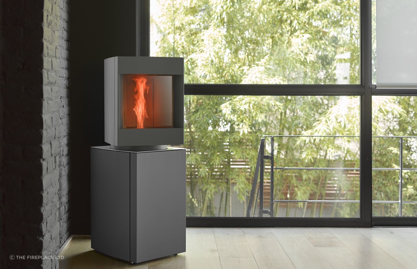 The award winning Stûv P-10 pellet freestanding fire comprises two distinct sections: at the top is a real fire, designed to show off the flames, while underneath there is a stock of wood pellets and the technical components.