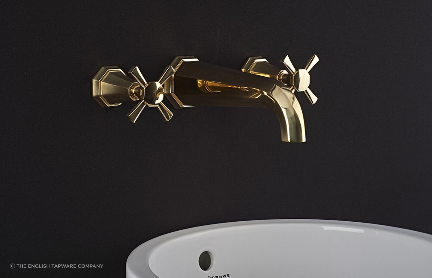 The undeniable allure of gold, seen here with the Perrin &amp; Rowe Deco Wall Mounted Basin Taps