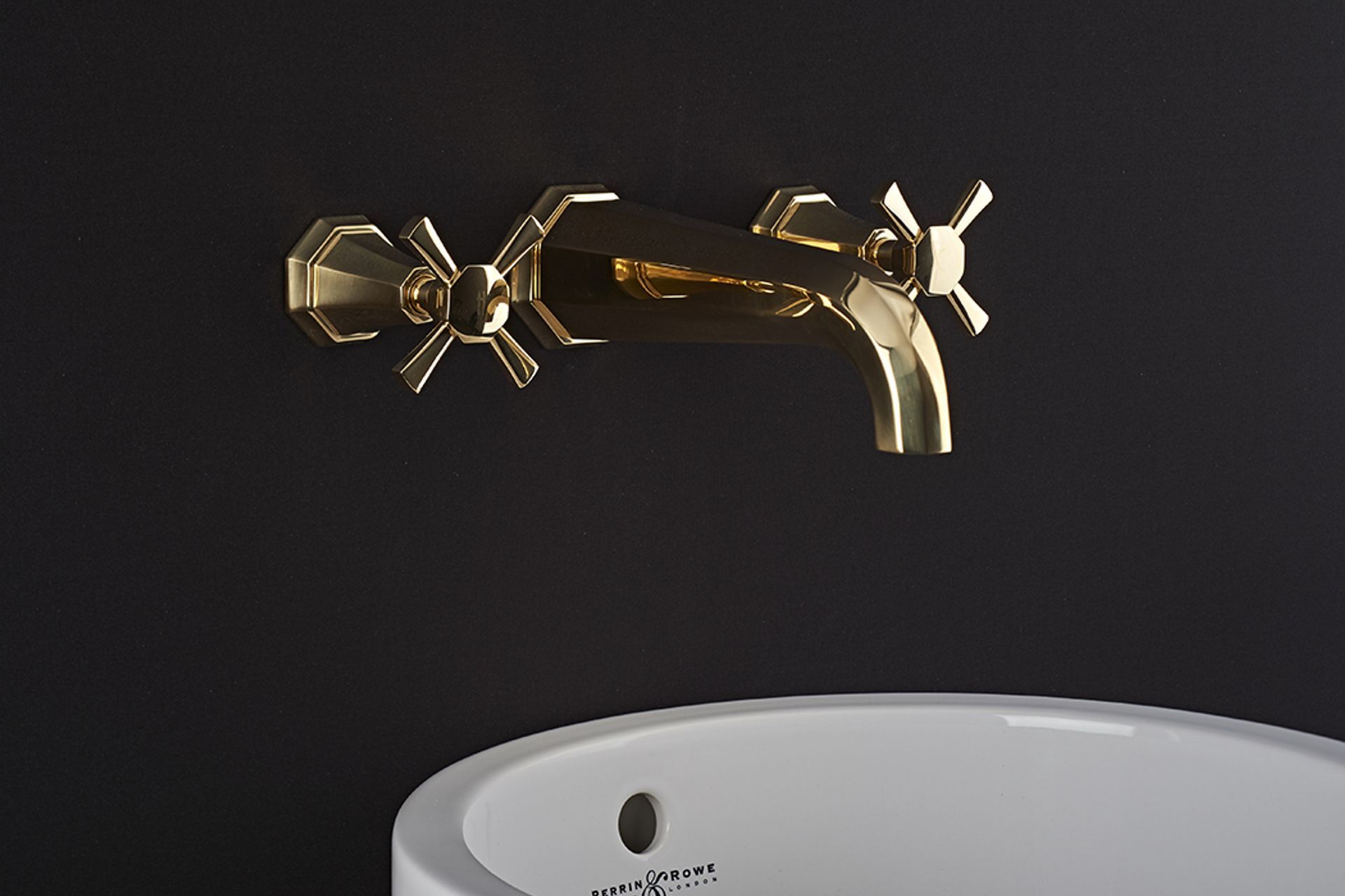 The undeniable allure of gold, seen here with the Perrin &amp; Rowe Deco Wall Mounted Basin Taps