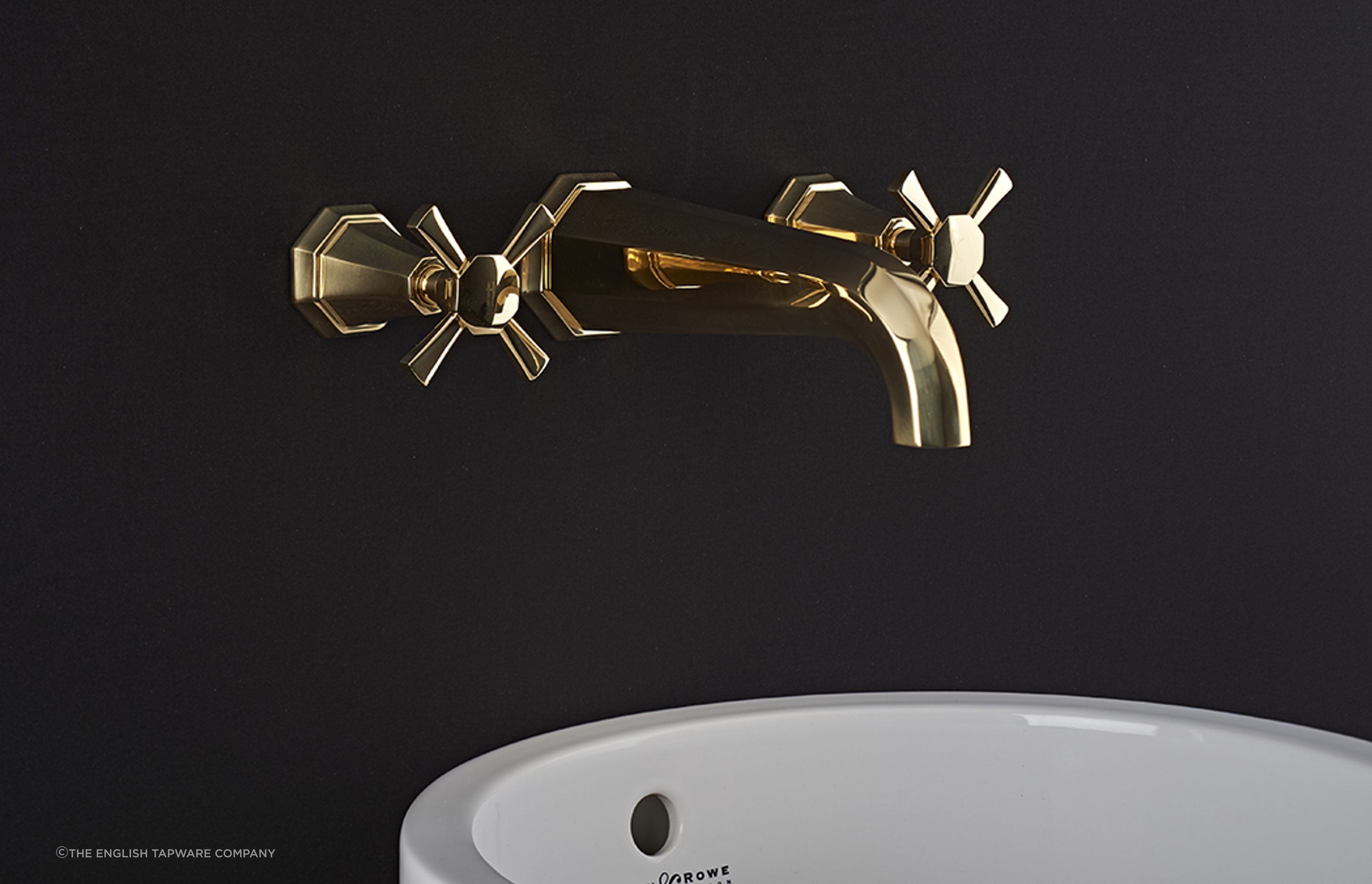 The undeniable allure of gold, seen here with the Perrin &amp; Rowe Deco Wall Mounted Basin Taps