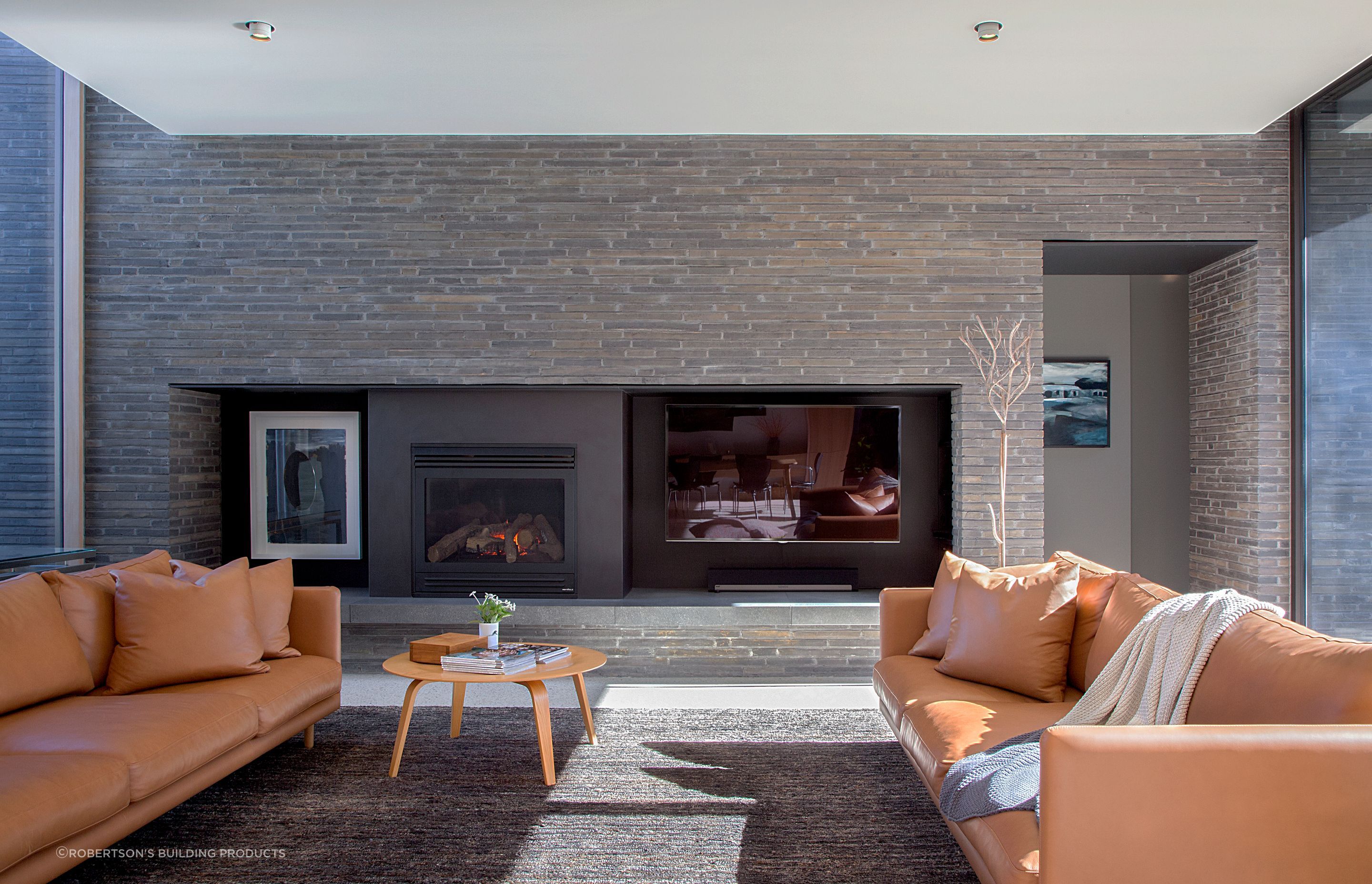 Petersen bricks bring a solidarity and texture to the interior of this Hawthorn home.