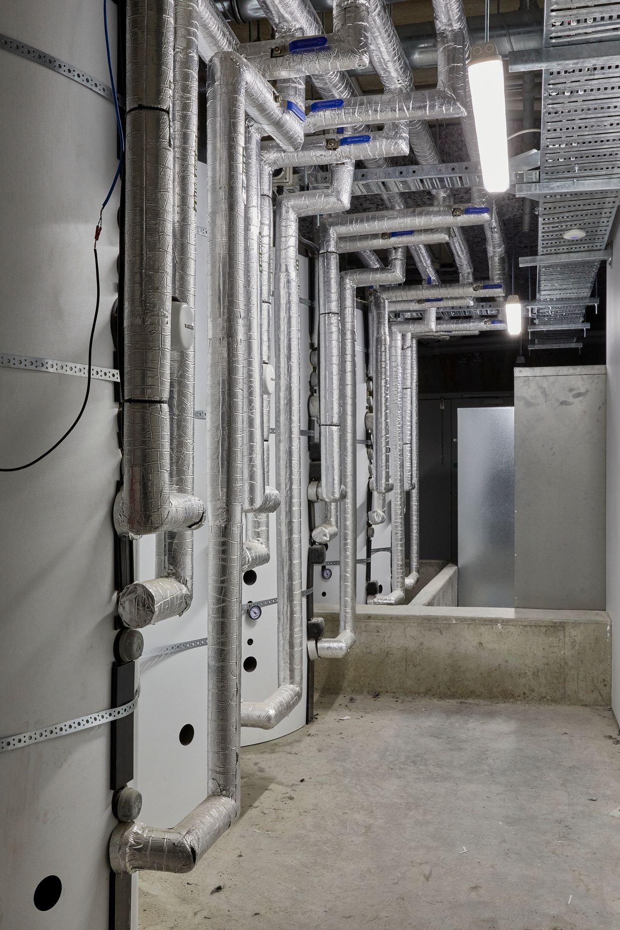 The plant room which contains the centralised hot water system.