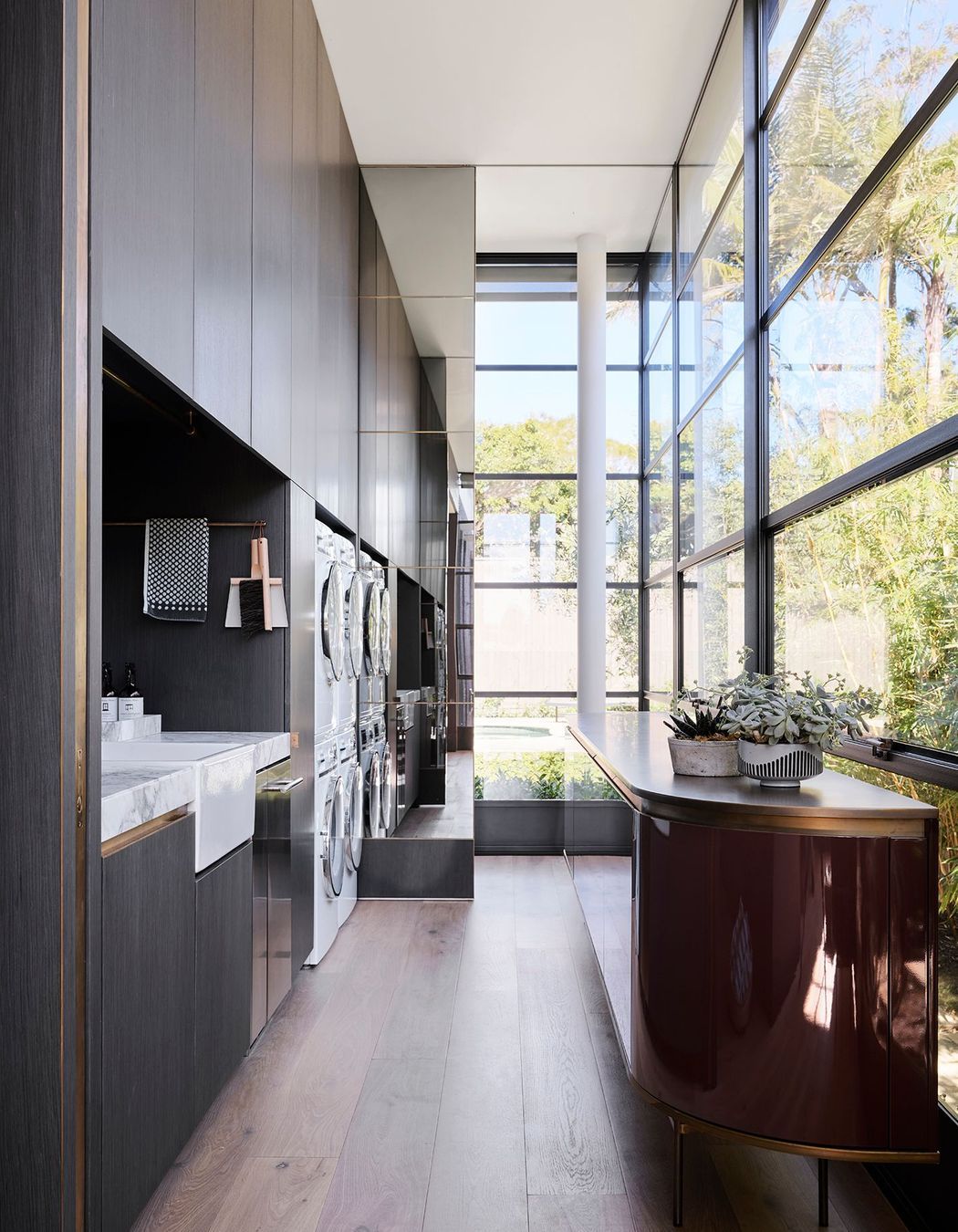 Joseph Giles Organo cabinet pulls are repurposed as towel rails.