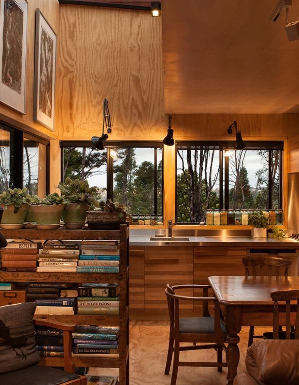 'Red House' by Crosson Architects is surrounded by native New Zealand bush, creating a utopic, cosy ambience