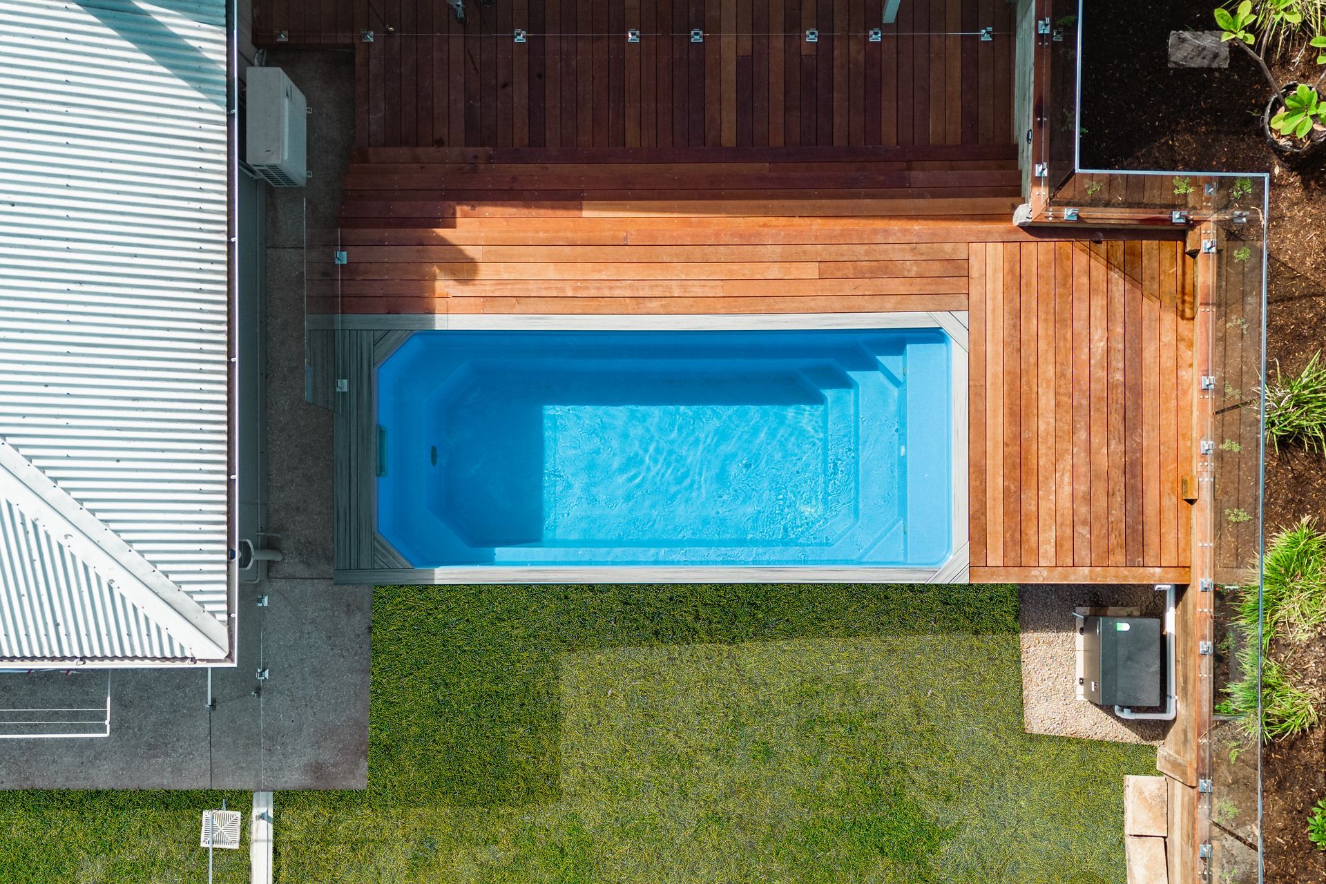 A site with a slope is an ideal location for a Little Pool Co above-ground pool.