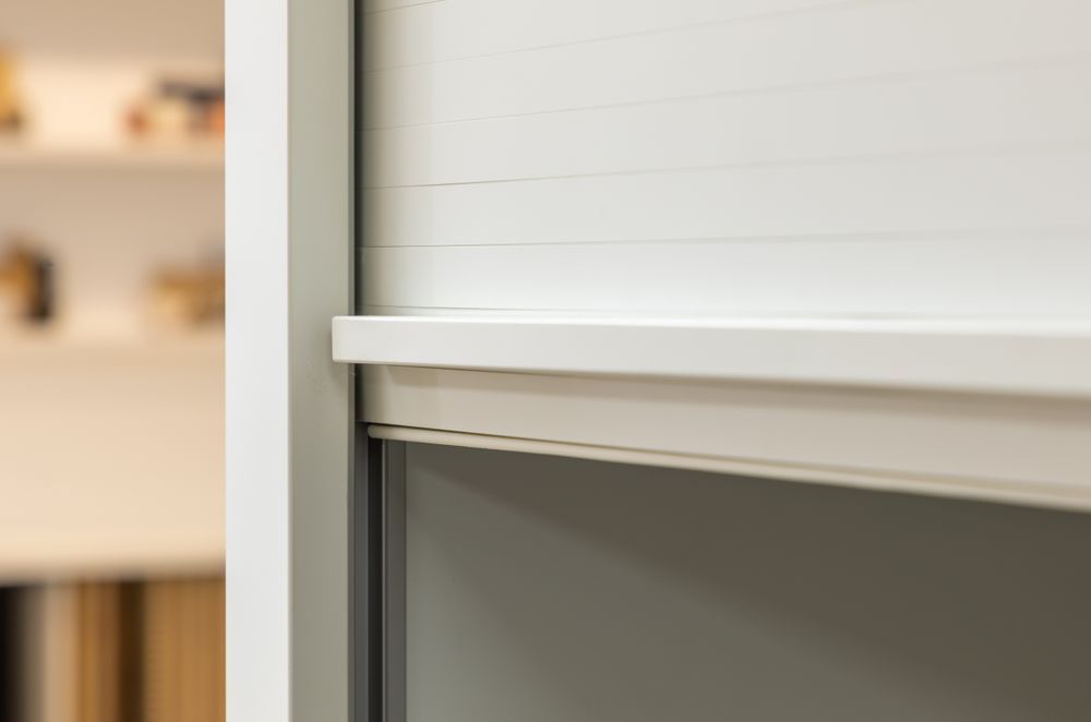 Roller door Acrymatte in 'Coconut' with a bar handle.