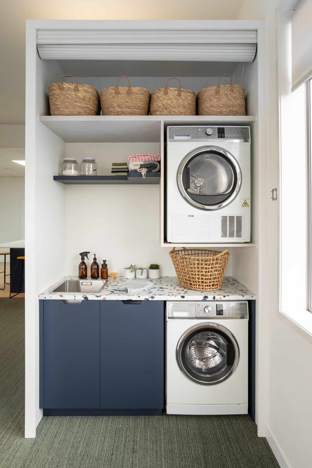 Roller doors are the perfect solution for a laundry cupboard.