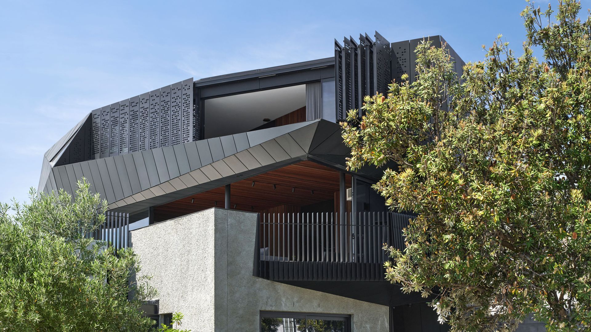 Harold features custom motorised perforated anodised aluminium panels from Shade Factor. video