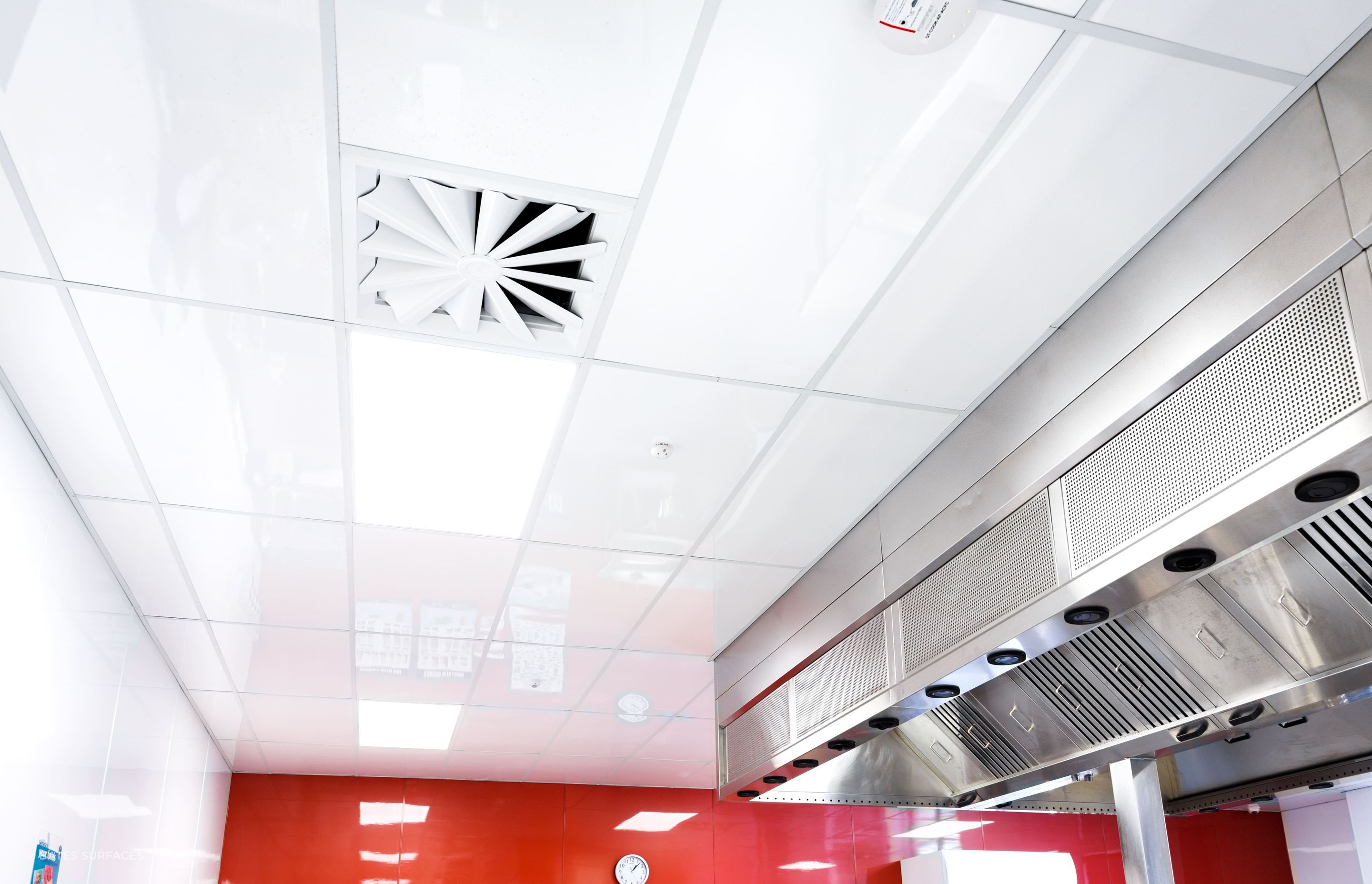 Ideal in a commercial kitchen setting, Fenta ceiling tiles are completely impervious to steam, grease and moisture.