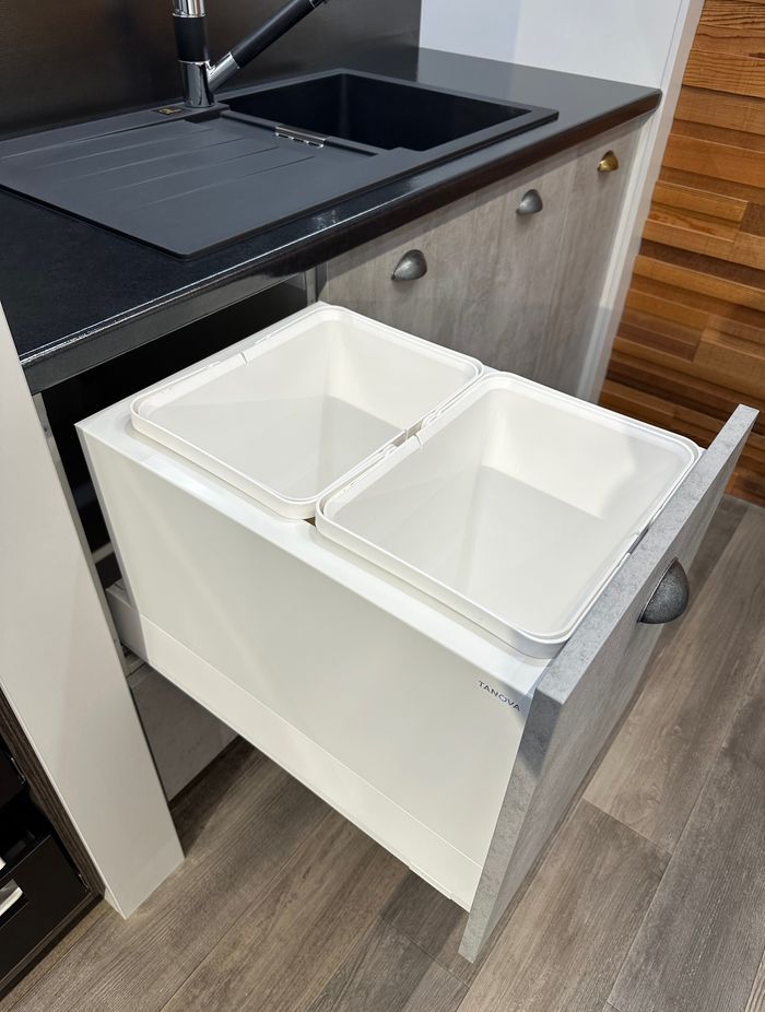 "The FLEX range offers optimal utilisation of the cabinet space, with options to place a 2 x 18L bin system into a 350mm cabinet, all while integrating with most slimwall soft closing drawers.” Picture: Tanova FLEX in White Shown on Merivobox Drawer.