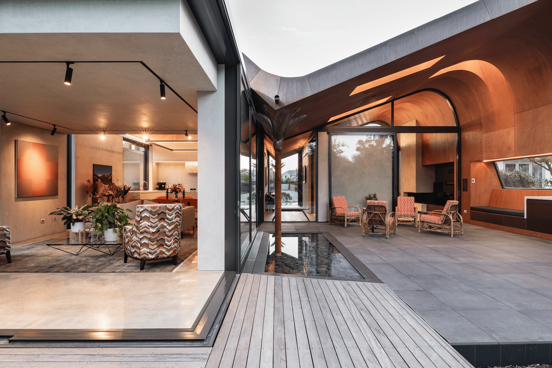 The pale grey coloured concrete tilt slab walls and ceilings complement the copper roof perfectly.