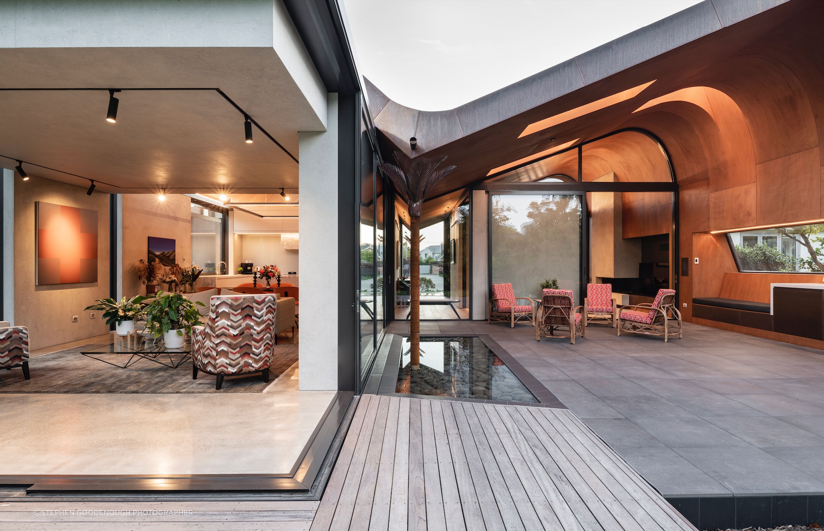 The pale grey coloured concrete tilt slab walls and ceilings complement the copper roof perfectly.
