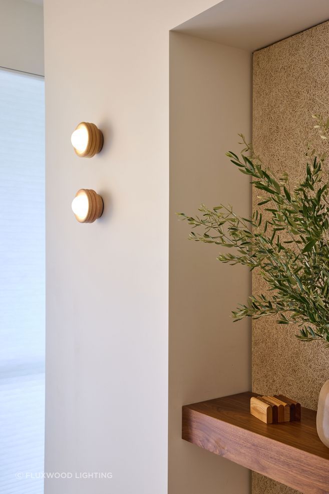 Silo Sconce adding a sculptural warmth with rich tonal depth.