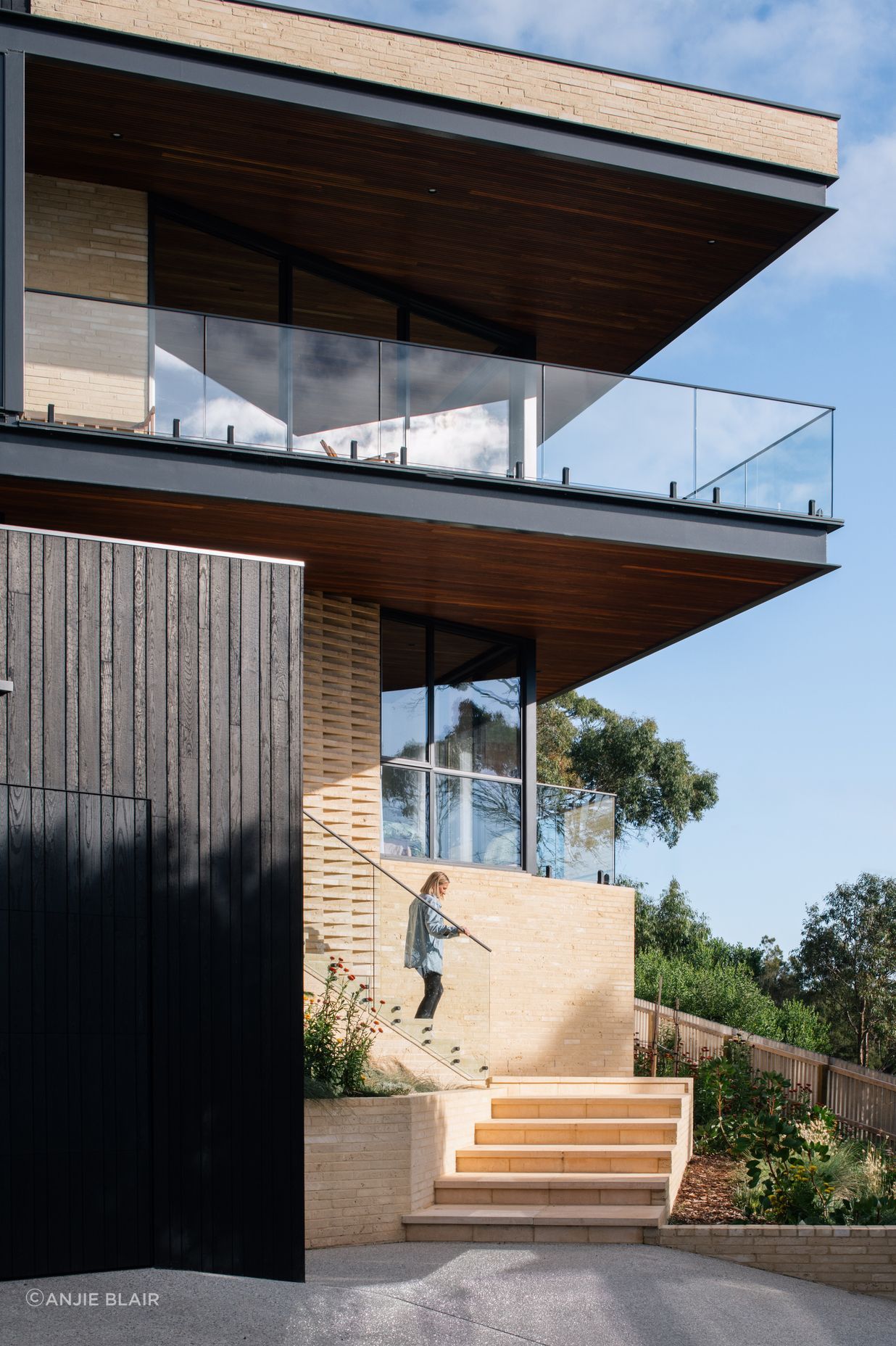 Natural materials complement the home's location.