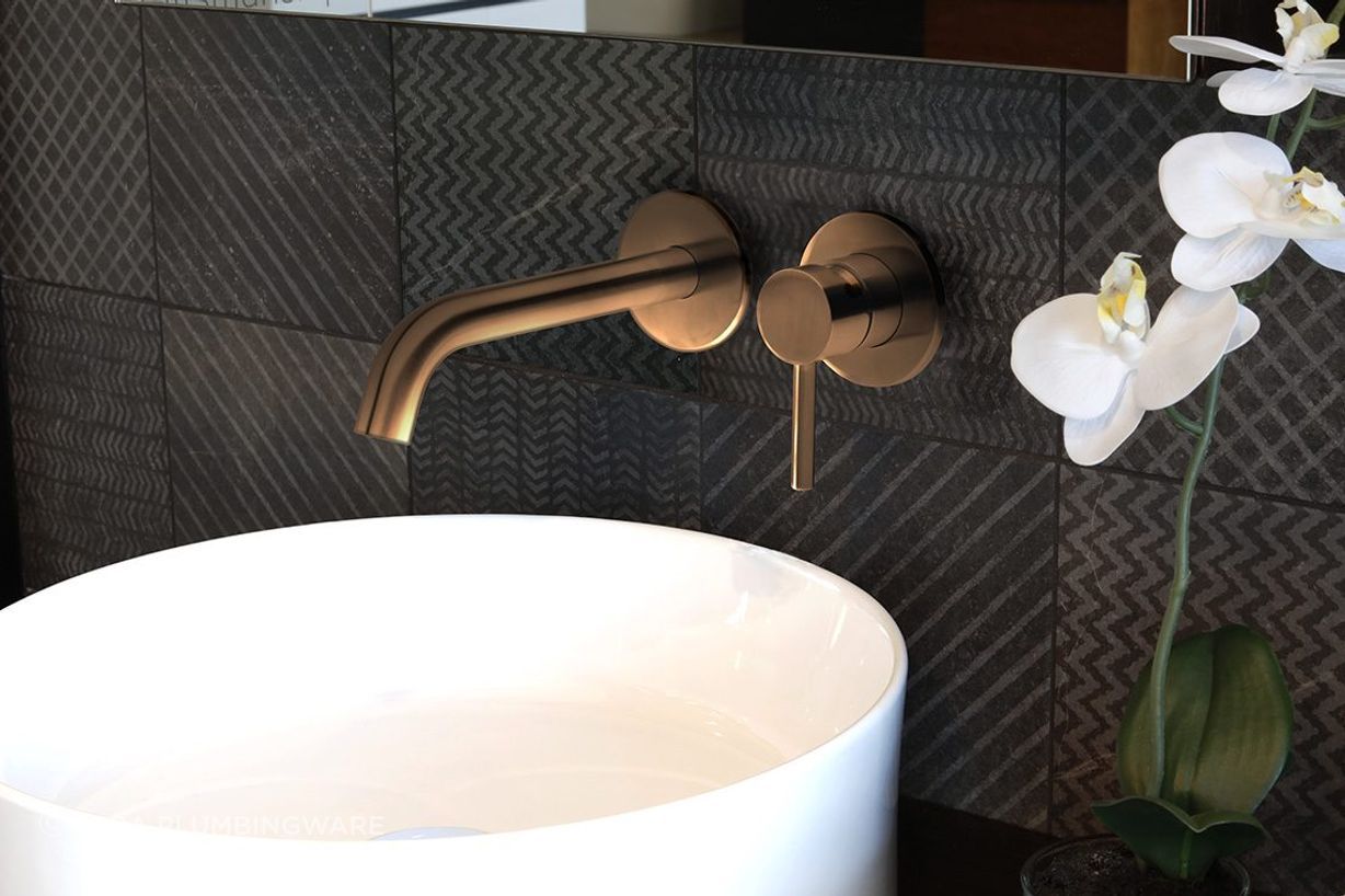 Storm wall mounted basin mixer.