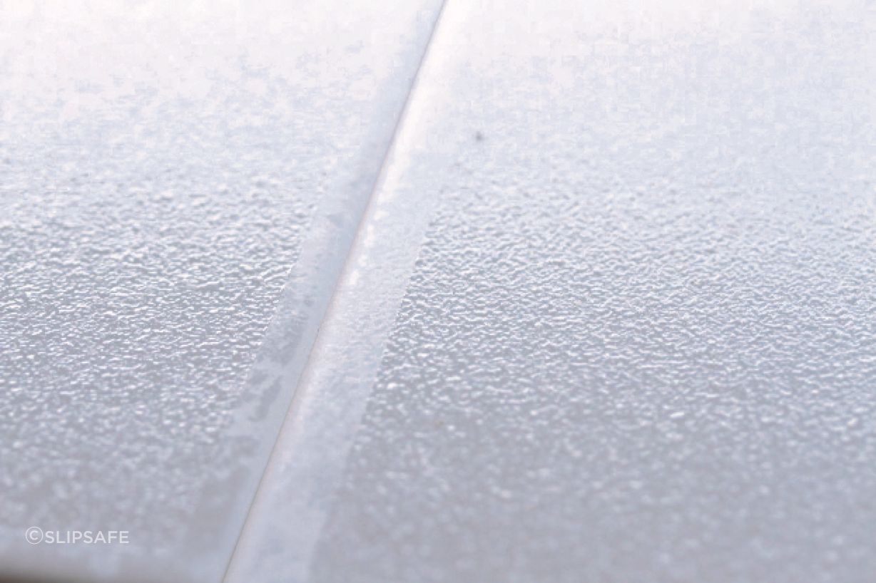 A close-up of Swiss Grip shows its textured surface.
