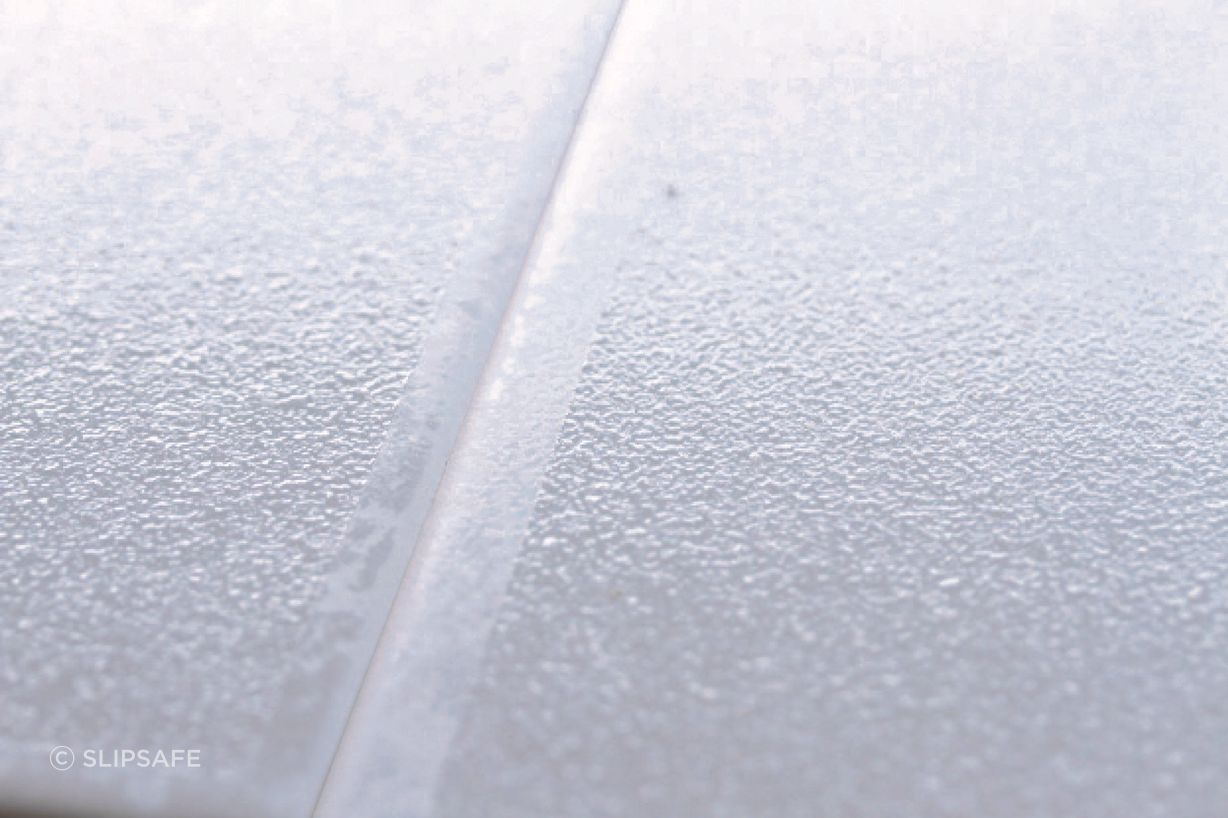 A close-up of Swiss Grip shows its textured surface.