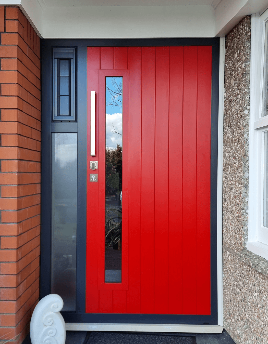 Bright and playful. this composite door features a glass window and vertical grooves.