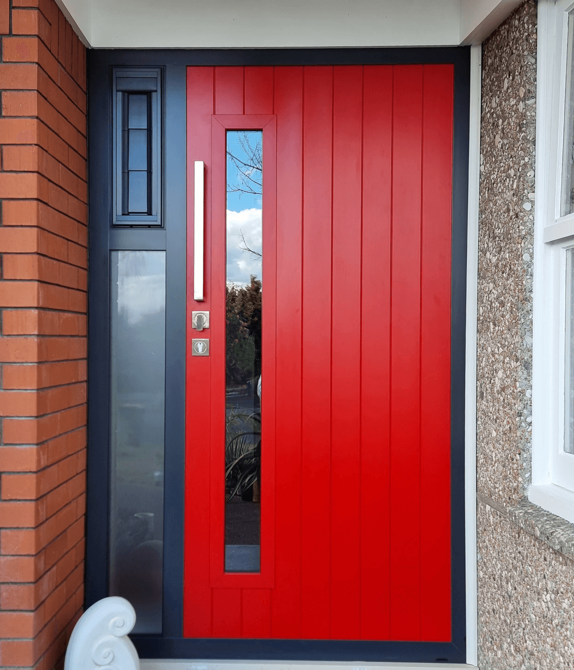 Bright and playful. this composite door features a glass window and vertical grooves.