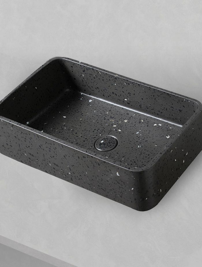 The undeniable classy quality of black concrete and terrazzo stone comes to the fore with the Black Terrazzo Basin.