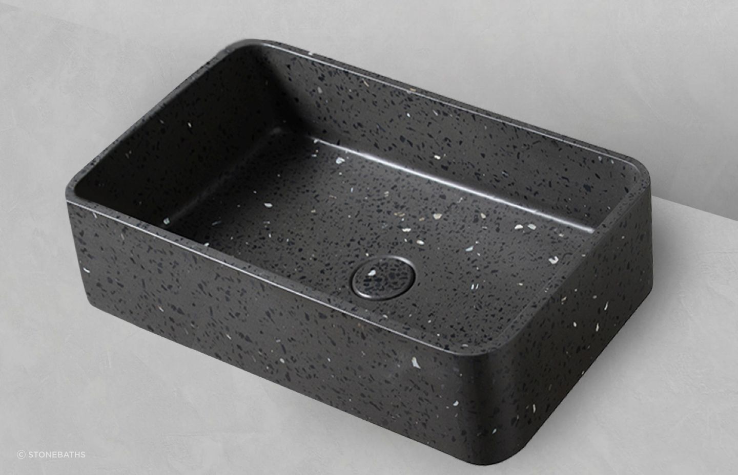 The undeniable classy quality of black concrete and terrazzo stone comes to the fore with the Black Terrazzo Basin.