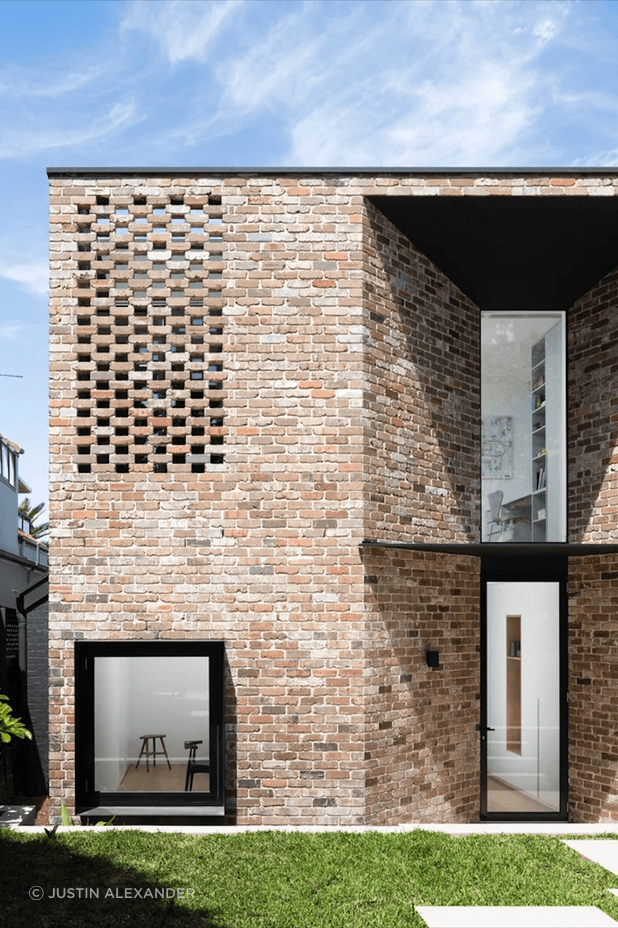 The Rose House by Brcar Morony Architecture uses recycled bricks throughout, many of which were salvaged from the existing structure.