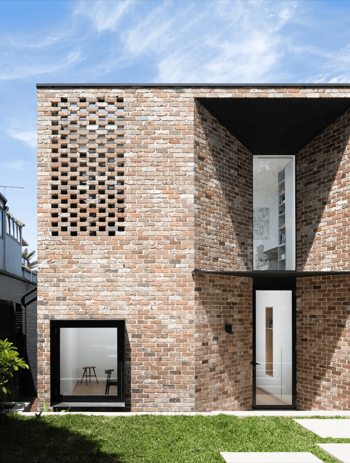 The Rose House by Brcar Morony Architecture uses recycled bricks throughout, many of which were salvaged from the existing structure.