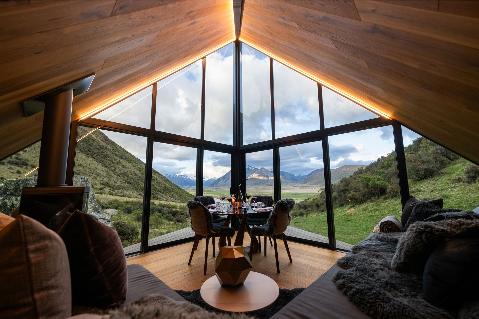 The bench seats are built in to the walls, extending out further than the floor to maximise space.