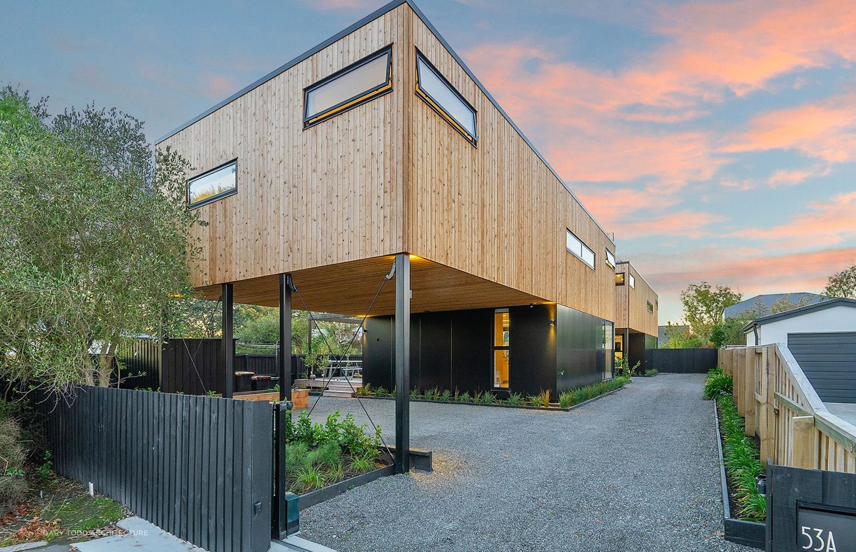 A stylish black timber fence complements this exquisite home in St Albans, Christchurch