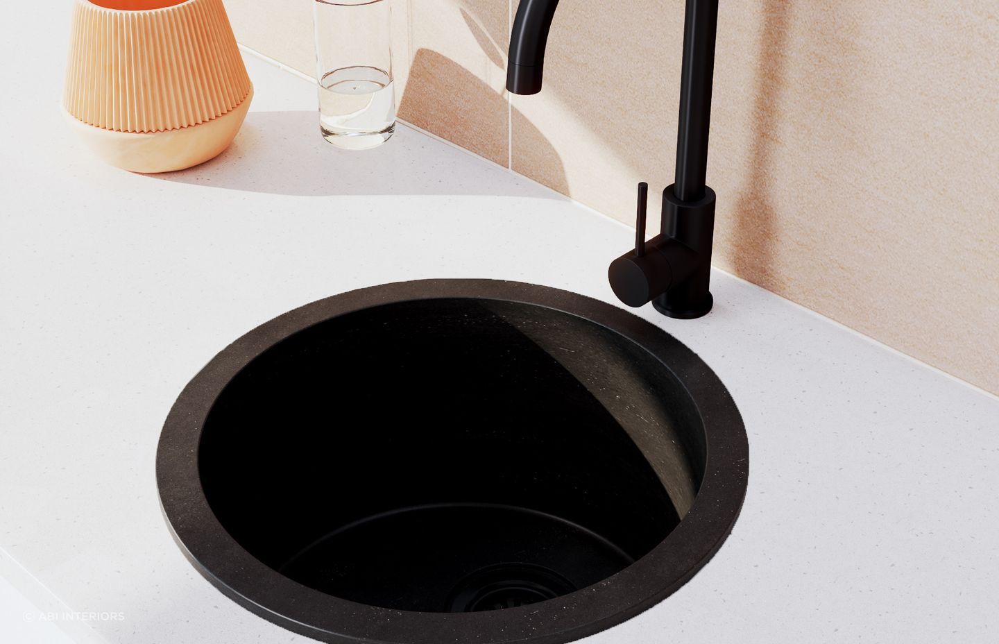 The ABI Vera Round Sink in Black Granite is a compact and versatile bathroom sink with subtle textural qualities.