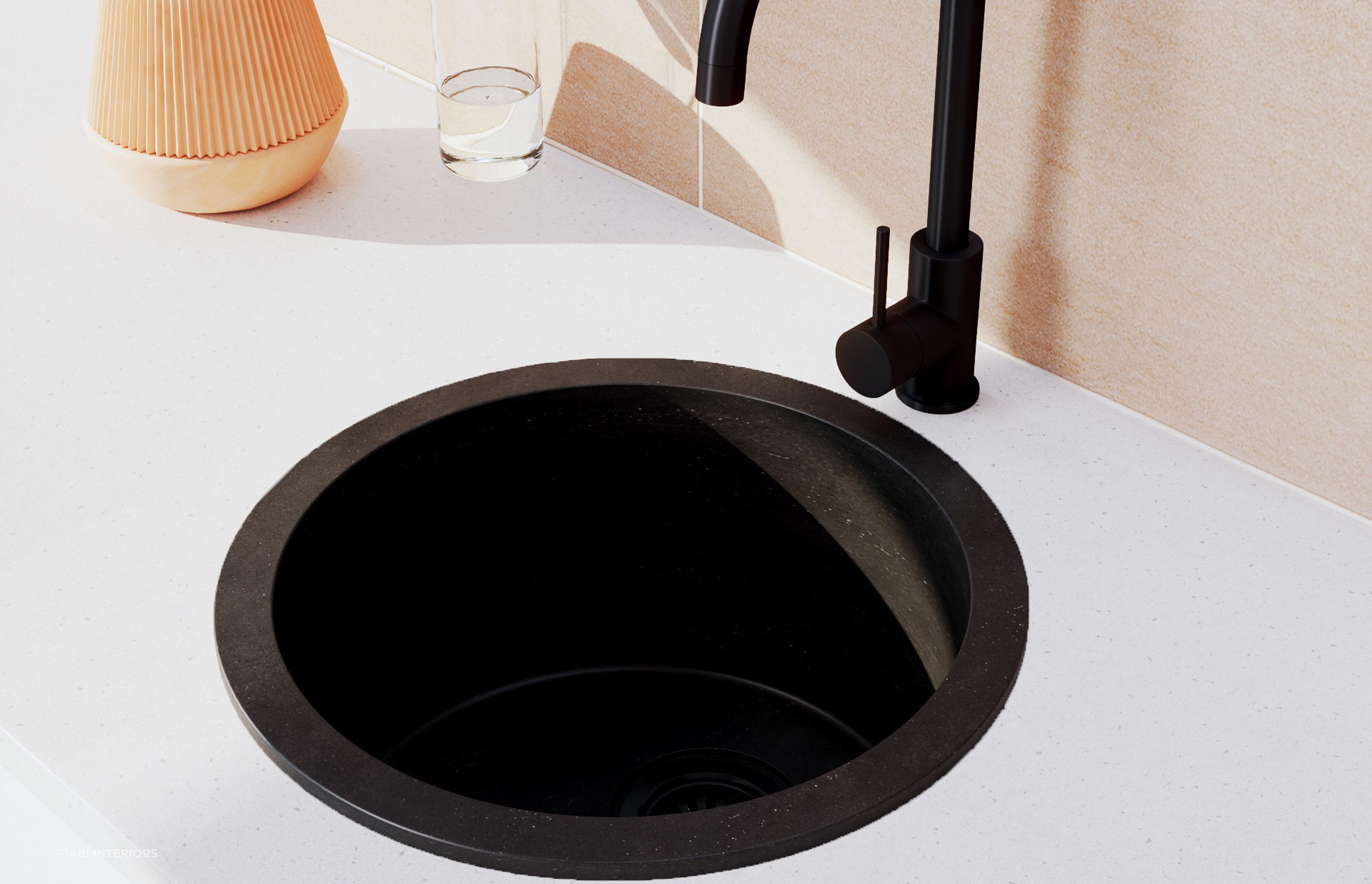 The ABI Vera Round Sink in Black Granite is a compact and versatile bathroom sink with subtle textural qualities.