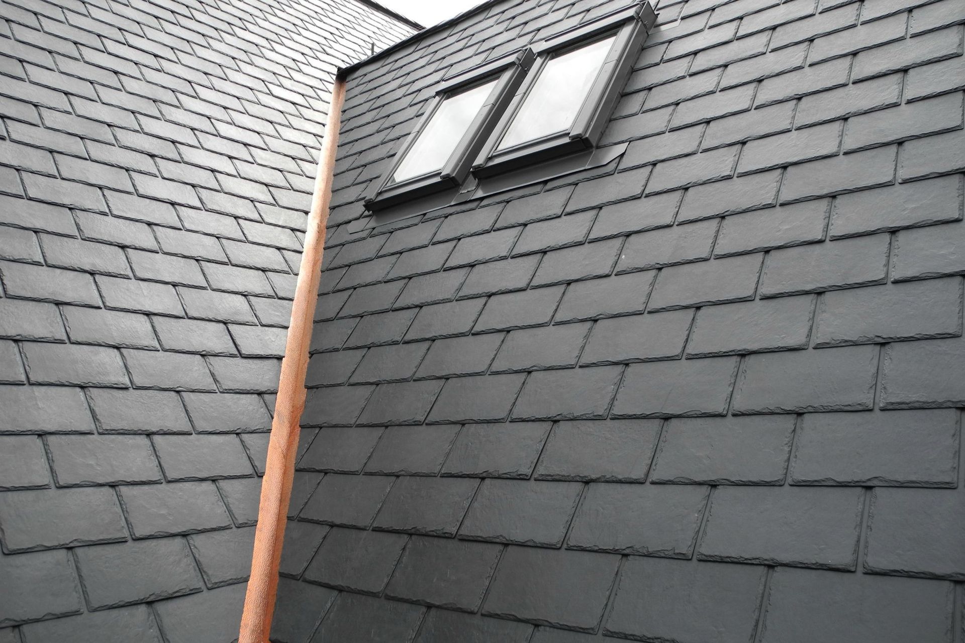 Viking EcoStar tiles are injection-moulded using over 50 different moulds to imitate chiseled slate.