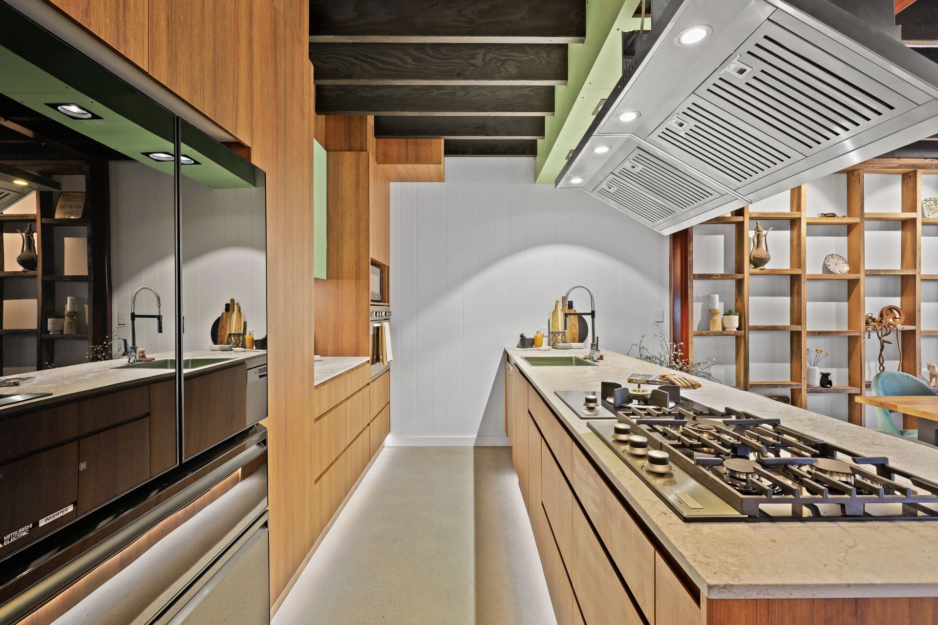 Warm woodgrain kitchen by JPC Kitchens
