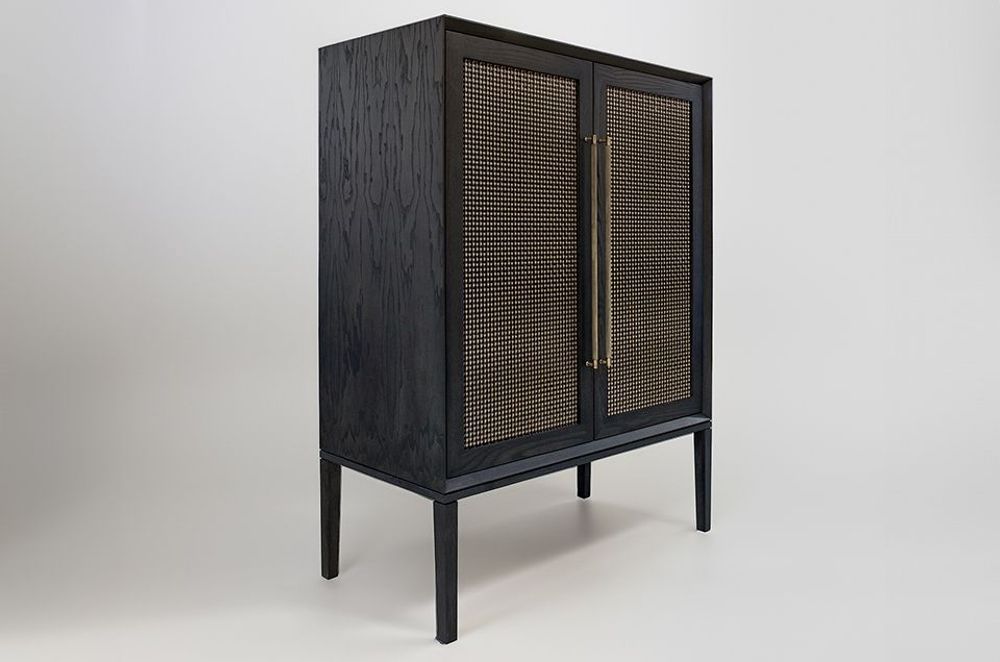 Sarsfield Brooke's new Wimberley bar cabinet design in American Ash initially came to life on CAD by the in-house designers.    Boasting woven brass door panels, brass door handles, adjustable timber shelving and automated LED lighting.