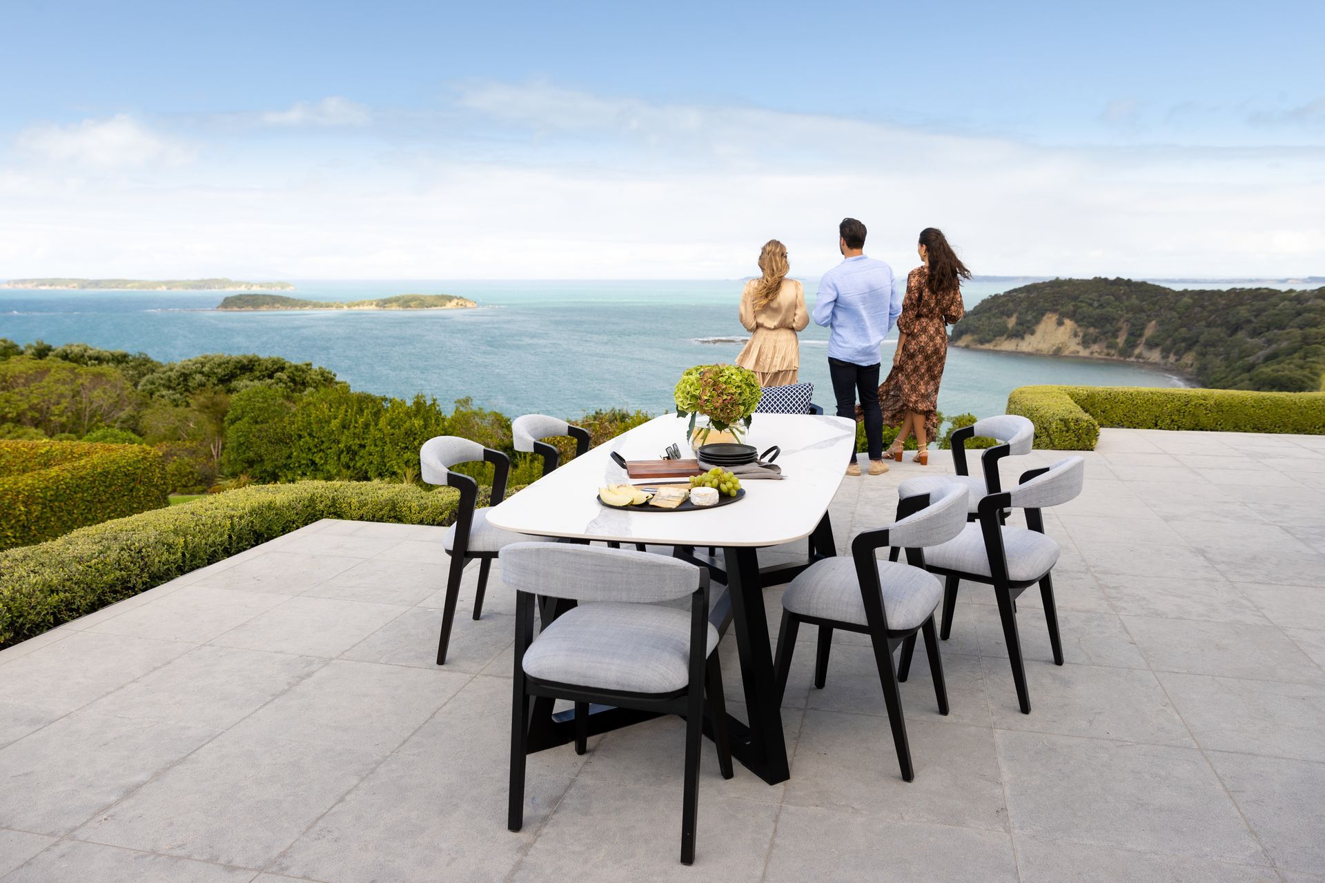 The Perseus Porcelain Dining Table, pictured here with the Porto Dining Chair, is the ideal host for everything from barbecues to three-course dinners.