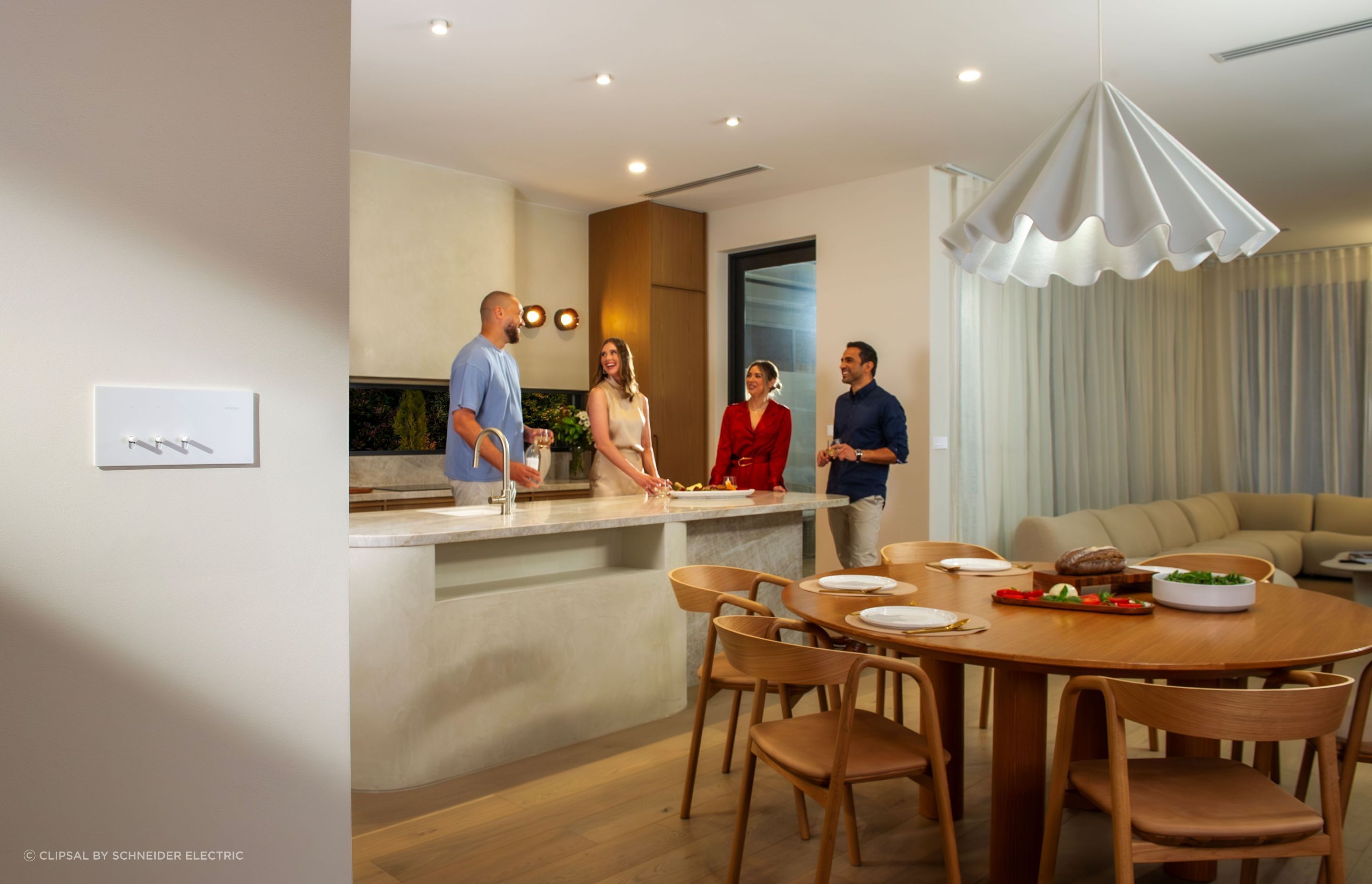 “Every household has its little rituals, and your Clipsal Wiser Smart Home can instantly set the mood. Whether it’s setting mood lighting for dinnertime or dimming the lights and closing the blinds for movie nights, just set the moment exactly how you want it once, then call up your saved settings next time.” Image: Clipsal Solis T Series Flush Switch 3 Gang in White Ceramic.