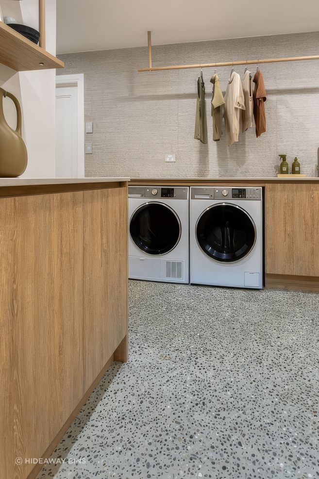 basement-laundry-with-integrated-laundry-hampers-hidden-2-upscaled-by-Replicate.jpg