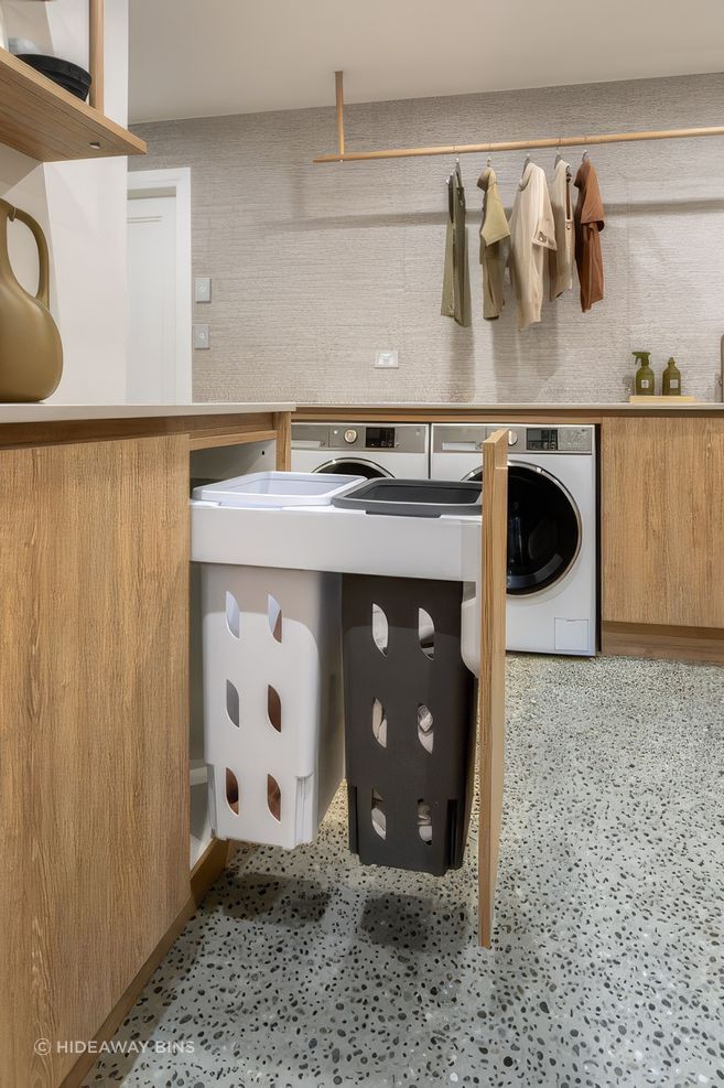 basement-laundry-with-integrated-laundry-hampers-in-view-2-upscaled-by-Replicate.jpg