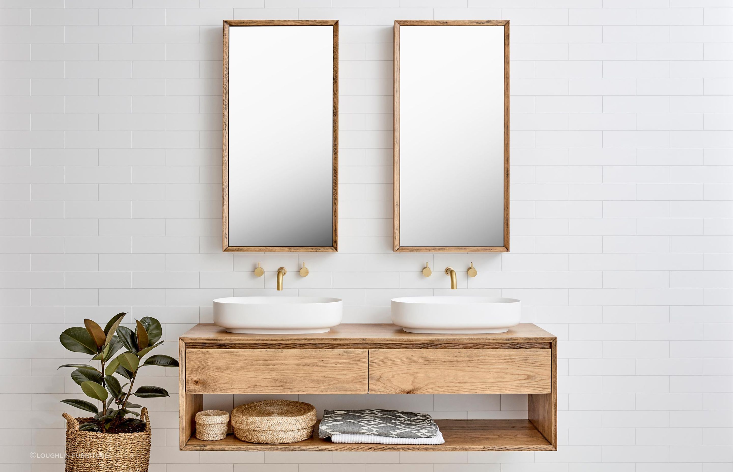 High-quality options like the Baxter Double Vanity allow you to showcase designer bathroom accessories
