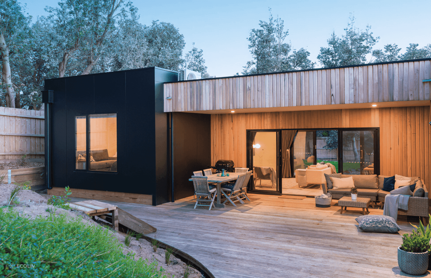 A curved deck, showcasing natural materials gives an elegant warmth and elevates a feeling of design as shown in this Cape Woolamai development.