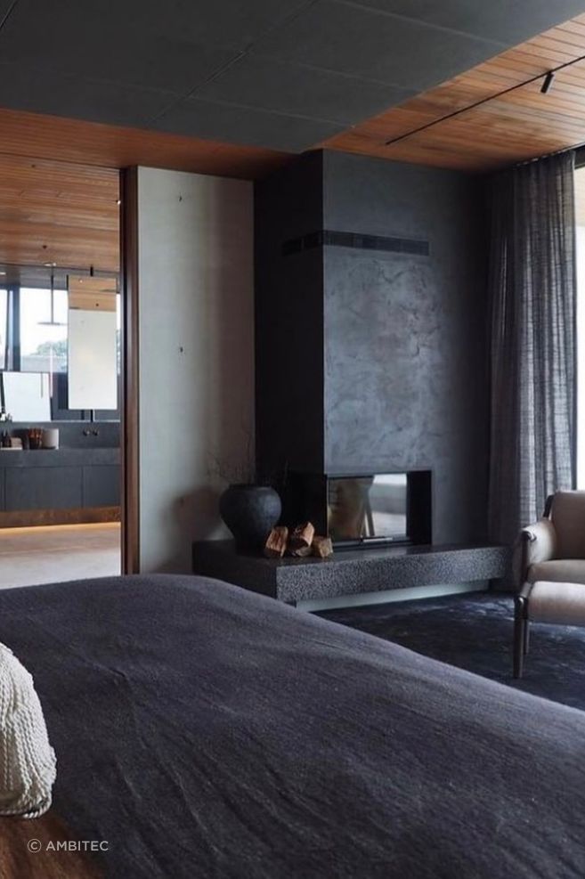 Suave in Imperial brown makes a dramatic statement in the master fireplace at Cliff House by Bosley Architects and Sonia Cotter Design.