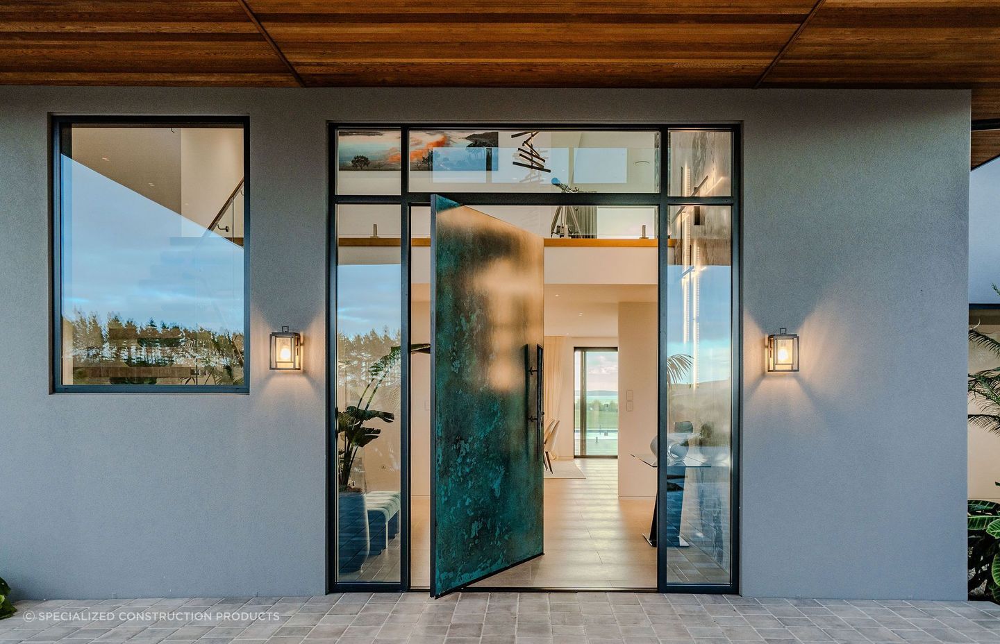 This Karikari Peninsula Residence uses Ezpanel 50mm AAC Concrete Panel Cladding by Specialized Construction Products to achieve a clean concrete facade.