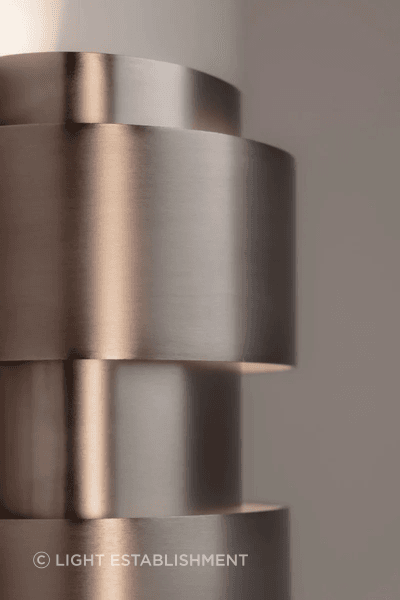 The Band-Oh! design allows for a clever play of light across the surface of the fixture, as well as light directed up and down in a V-shape.