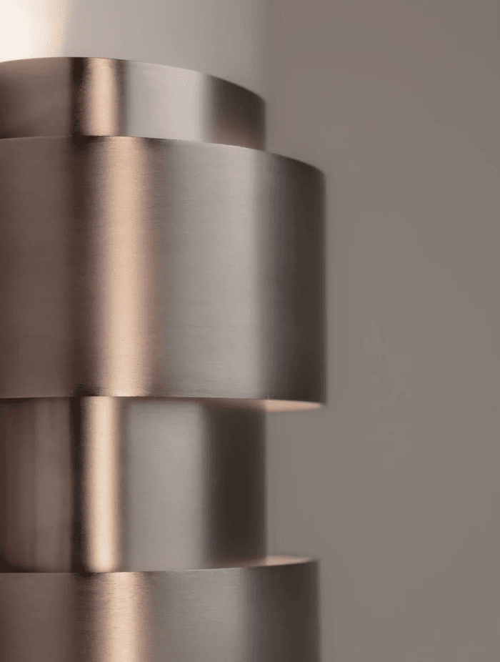 The Band-Oh! design allows for a clever play of light across the surface of the fixture, as well as light directed up and down in a V-shape.